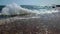 Stormy sea. Large High sea waves crashing and hitting against old concrete pier