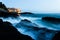 Stormy sea at sunset with church