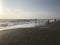 Stormy sea at sunset in Marina di Bibbona, Italy.