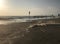 Stormy sea at sunset in Marina di Bibbona, Italy.