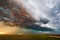 Stormy sky with dramatic clouds at sunset