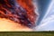 Stormy sky and dramatic shelf cloud at sunset