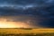 Stormy sky with dramatic sunlight at sunset