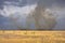 Stormy sky in the field, thunderstorm in the steppe, fire in the steppe