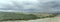 Stormy sky over Tuscan hilly green landscape, near San Quirico, Siena, Italy