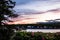 Stormy summer sunset sky over Long Cove in Bristol, Maine