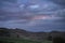 Stormy Sunset Clouds over Gritstone Rocks