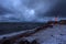 Stormy sunset on the Gulf of Finland at Shepelevsky lighthouse