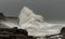 stormy waves hitting a light house