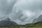 Stormy weather approaching during a hike through mountainous landscape and scenery near Bokonbayevo, Kyrgyzstan