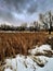 Stormy winter rustic landscape at the lake in Wyoming