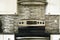 Stove closeup in kitchen interior.