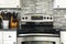 Stove closeup in kitchen interior.