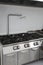 stoves in the industrial kitchen with stainless steel cabinets a