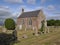 Stracathro Parish Church, a simple Red Sandstone T Plan designed place of worship.