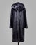 Straight cut black mink fur coat for shop catalogue, horizontal shot