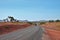 Straight desert road with camper van in Northern Territories, Australia