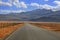 Straight empty road in Sierra mountains