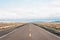 Straight, flat road in the desert of New Mexico