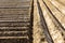 Straight furrows crossing at a right angle in a potato field