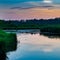 Straight River at sunset with reflection in Polk County, WI during summer