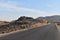 Straight road in the desertic landscape of Mount Lebanon in summer, Faraya, Lebanon