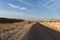 Straight road in the desrtic landscape of Mount Lebanon, road betrween Faraya and the Bakkaa valley, Lebanon