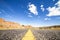 Straight road through empty wilderness in Utah