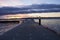 Straight view of a pier on a lake in a winter sunset at Waverly Beach Park, Kirkland, Washington