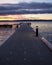 A straight view of a pier on a lake in a winter sunset at Waverly Beach Park, Kirkland, Washington