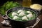straining dumplings added to zuppa toscana