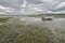 Stranded Boat on Rathtrevor Beach on a cloudy day