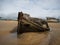 Stranded broken wooden shipwrecks on fishing boat naval graveyard marine cemetery in Magouer Etel river Brittany France