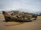 Stranded broken wooden shipwrecks on fishing boat naval graveyard marine cemetery in Magouer Etel river Brittany France