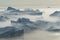 Stranded icebergs in the fog at the mouth of the Icefjord near I