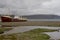 Stranded ship, Iceland. Rusty boat stuck on coast in West Fjords.