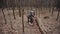 Strange correspondent reporter finds jar of canned mushrooms. Hunter forest ranger dressed in camouflage suit tells