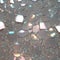Strange metal and glass fragments shimmering pastel background seq 9 of 27