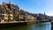 Strasbourg cityscape overlooking typical townhouses on waterfront