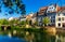 Strasbourg cityscape overlooking typical townhouses on waterfront