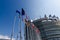 Strasbourg, France. August 2019.The entrance to the modern seat of the European parliament. A row of flagpoles with the flags of