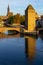 Strasbourg iconic cityscape. Petite France historic medieval district with Ill river and the cathedral in the background.