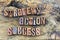 Strategy action success wooden letters