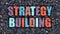 Strategy Building Concept. Multicolor on Dark Brickwall.