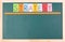 Strategy, colorful word on blank blackboard