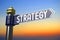 Strategy - signpost with one arrow, sunset sky