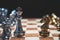 Strategy of strong leadership as king and weak leadership as horse facing each other in wooden chess board. Business marketing