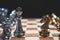 Strategy of strong leadership as king and weak leadership as horse facing each other in wooden chess board. Business marketing of