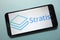 Stratis STRAT cryptocurrency logo displayed on smartphone