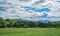 Stratocumulus Storm Clouds Over the Valley and Mountains